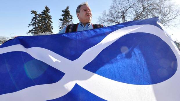 Manitoba Métis Federation president David Chartrand with the Métis Infinity Flag (Robert Tinker for The Globe and Mail).